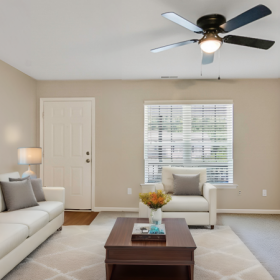 Living room with couch, and chair